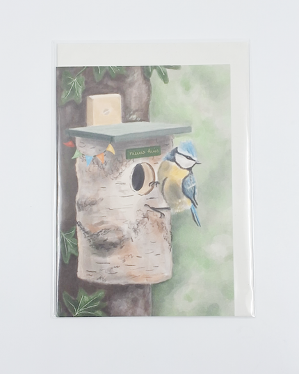 Wenskaart vogel en vogelhuis