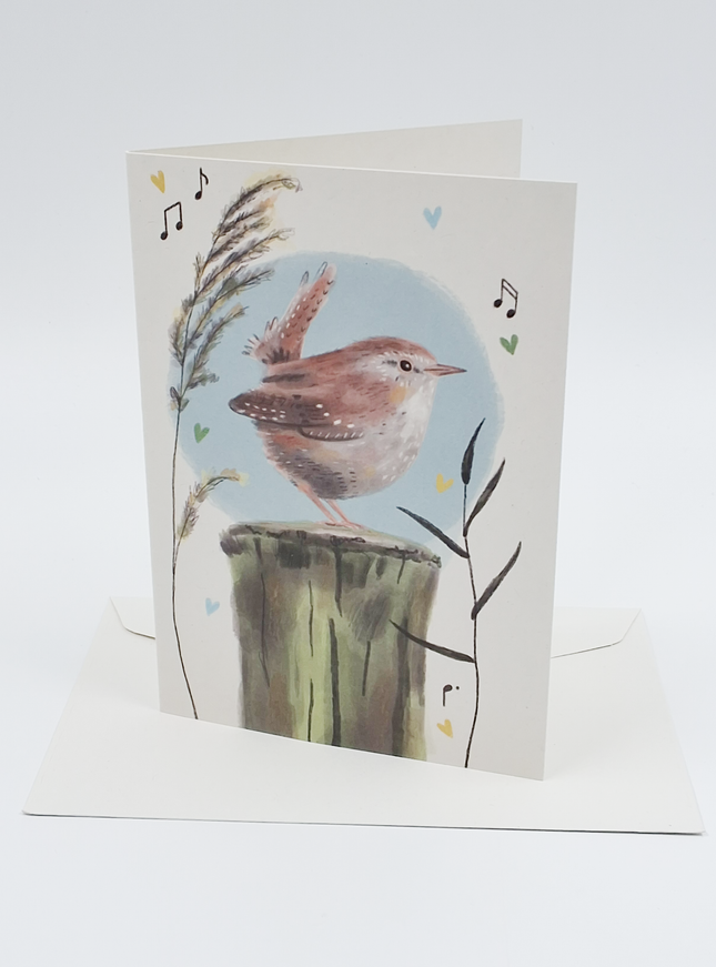 Wenskaart vogel op boomstam