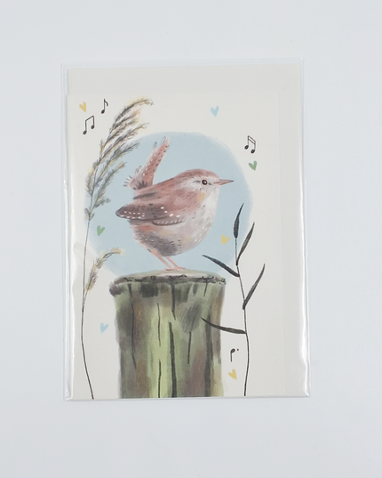 Wenskaart vogel op boomstam