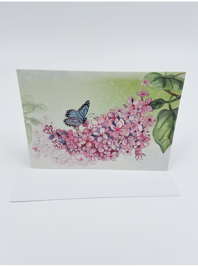 Wenskaart vlinder op bloementak