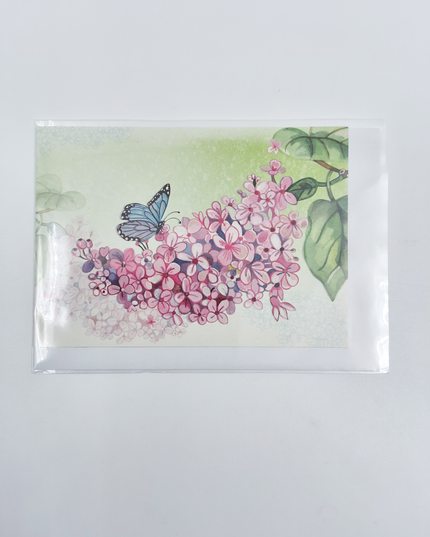 Wenskaart vlinder op bloementak