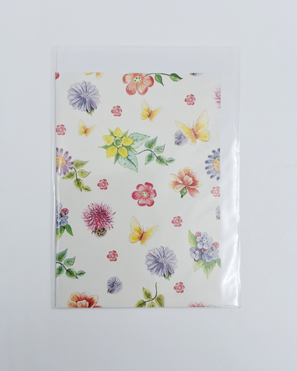 Wenskaart bloemen met vlinders