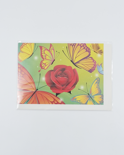 Wenskaart kleurige vlinders met roos
