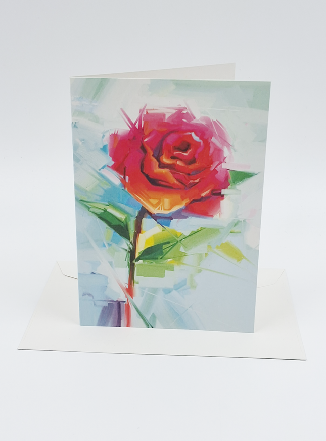 Wenskaart roos op blauwe achtergrond