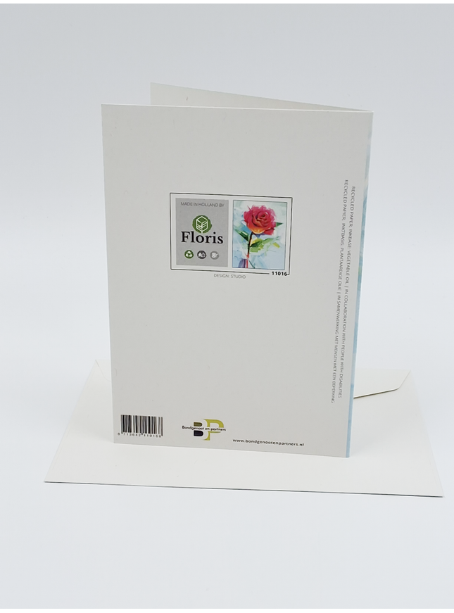 Greeting card rose on blue background