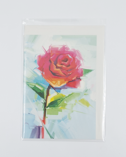 Wenskaart roos op blauwe achtergrond