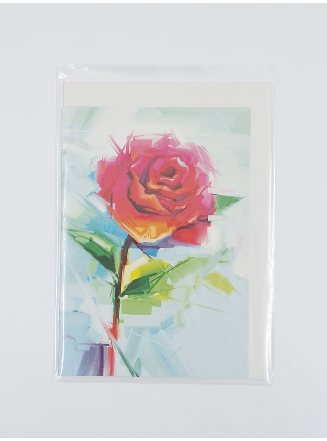 Greeting card rose on blue background