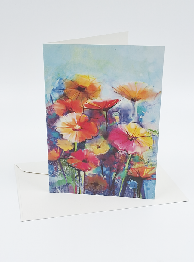 Wenskaart gerbera oranje/roze/geel