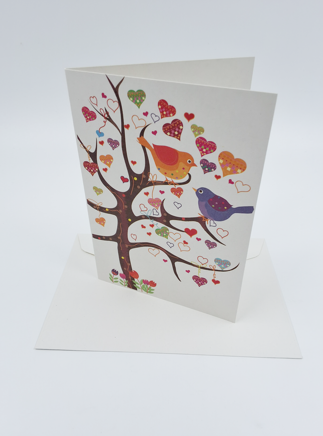 Wenskaart boom vogels hartjes