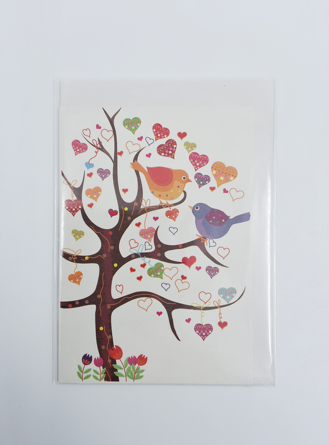 Wenskaart boom vogels hartjes
