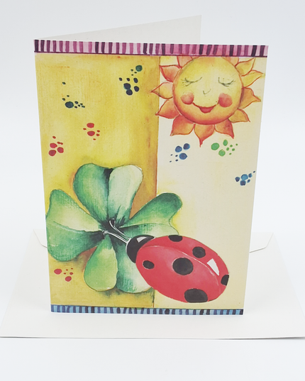 Wenskaart lieveheersbeest klaver zon