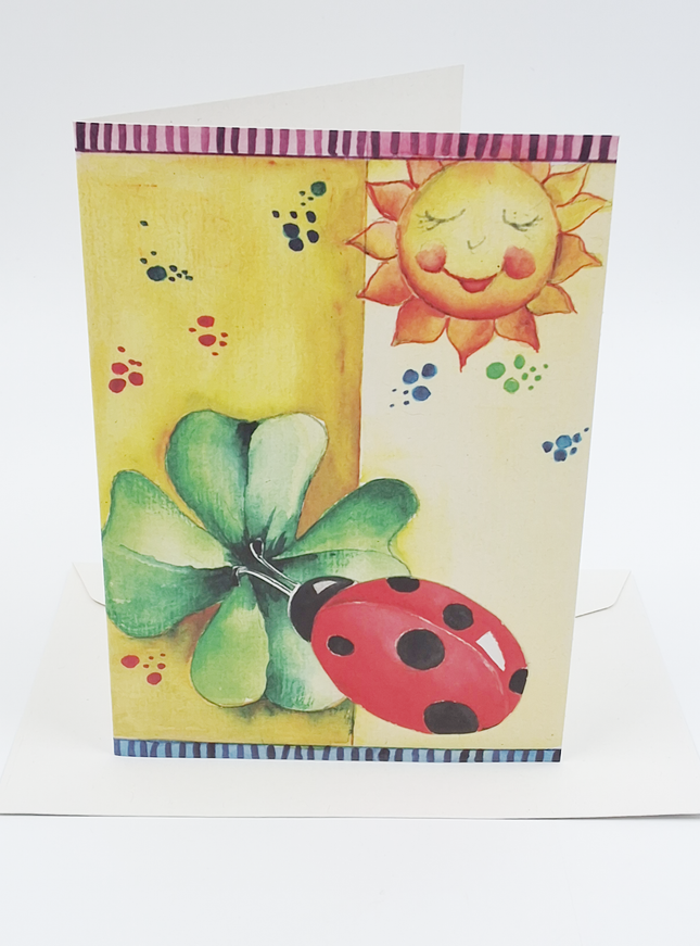 Wenskaart lieveheersbeest klaver zon