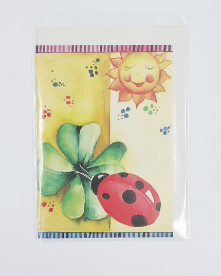 Wenskaart lieveheersbeest klaver zon