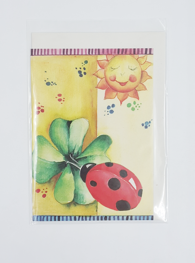 Wenskaart lieveheersbeest klaver zon