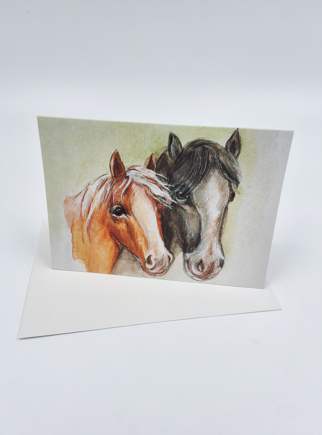 Wenskaart twee paardehoofden