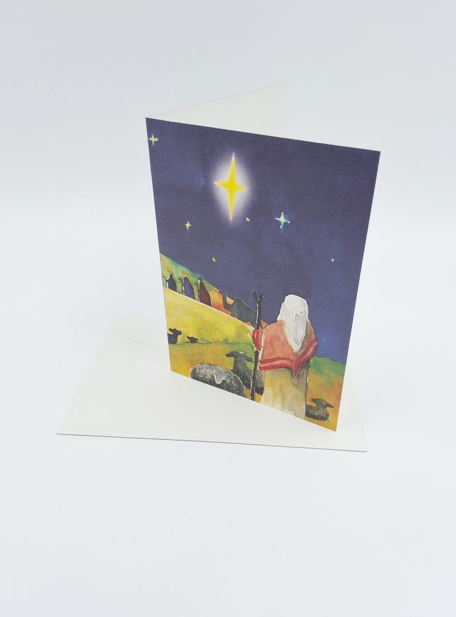 Kerstkaart herder kijkt naar wijzen