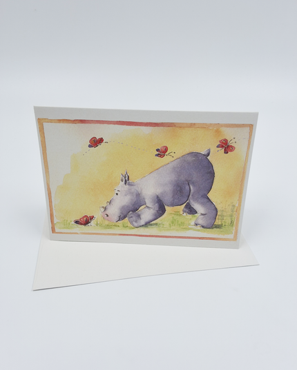Wenskaart neushoorn vlinders