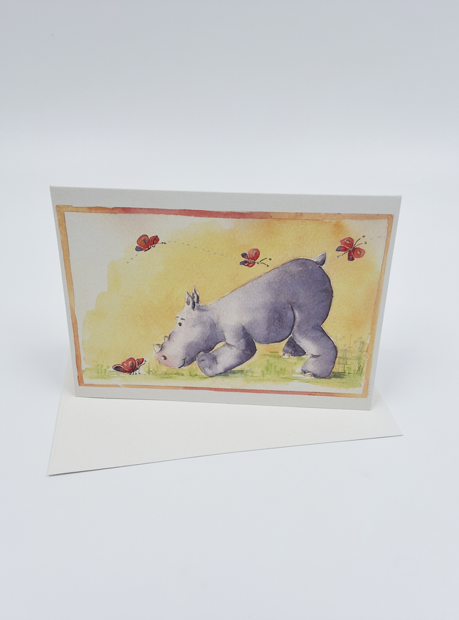 Wenskaart neushoorn vlinders