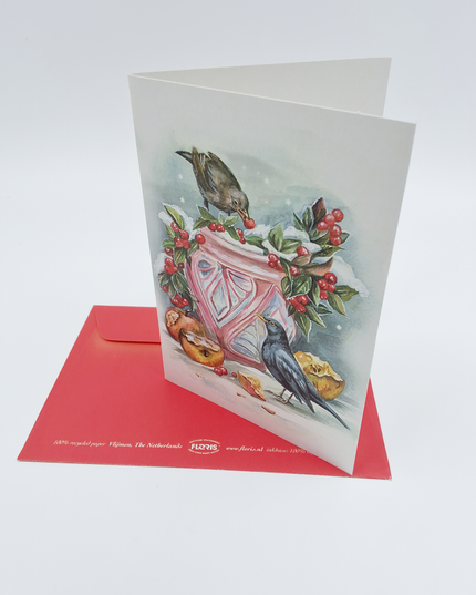 Wenskaart bloempot in sneeuw met merels