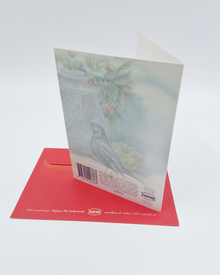 Wenskaart bloempot in sneeuw met merels