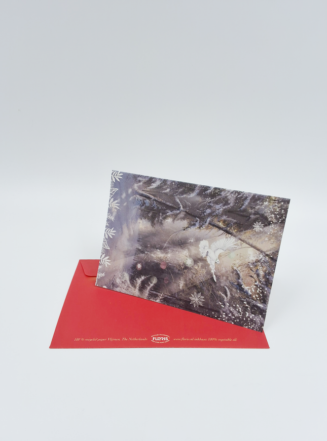 Wenskaart kerstduif in bos