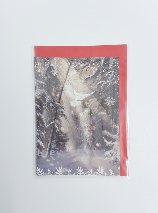 Wenskaart kerstduif in bos