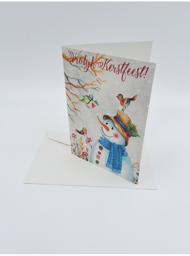 Greeting card snowman with birds