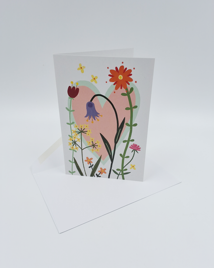 Wenskaart bloem met hart...