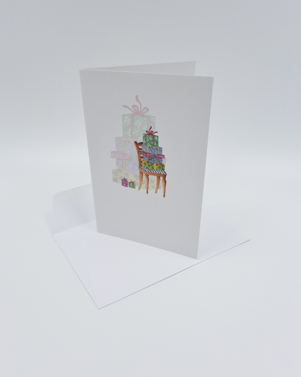 Wenskaart stoel met cadeau